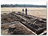 Mike and David survey the previous day's work on the L&D observatory footings.