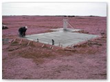 Darren finishes the slab for Dan's observatory.