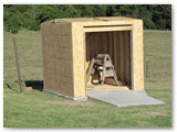 May of 2009 and first building construction.  A shed for tool and lawnmower storage.