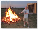 Larry demonstrates techniques for scrap wood disposal in the boonies.  Just wait for a calm evening!