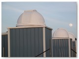 February's fA full moon rises over the north domes.