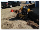 Trenching in electrical and networking.  Keeping with tradition, we get the trencher stuck in its own ditch.